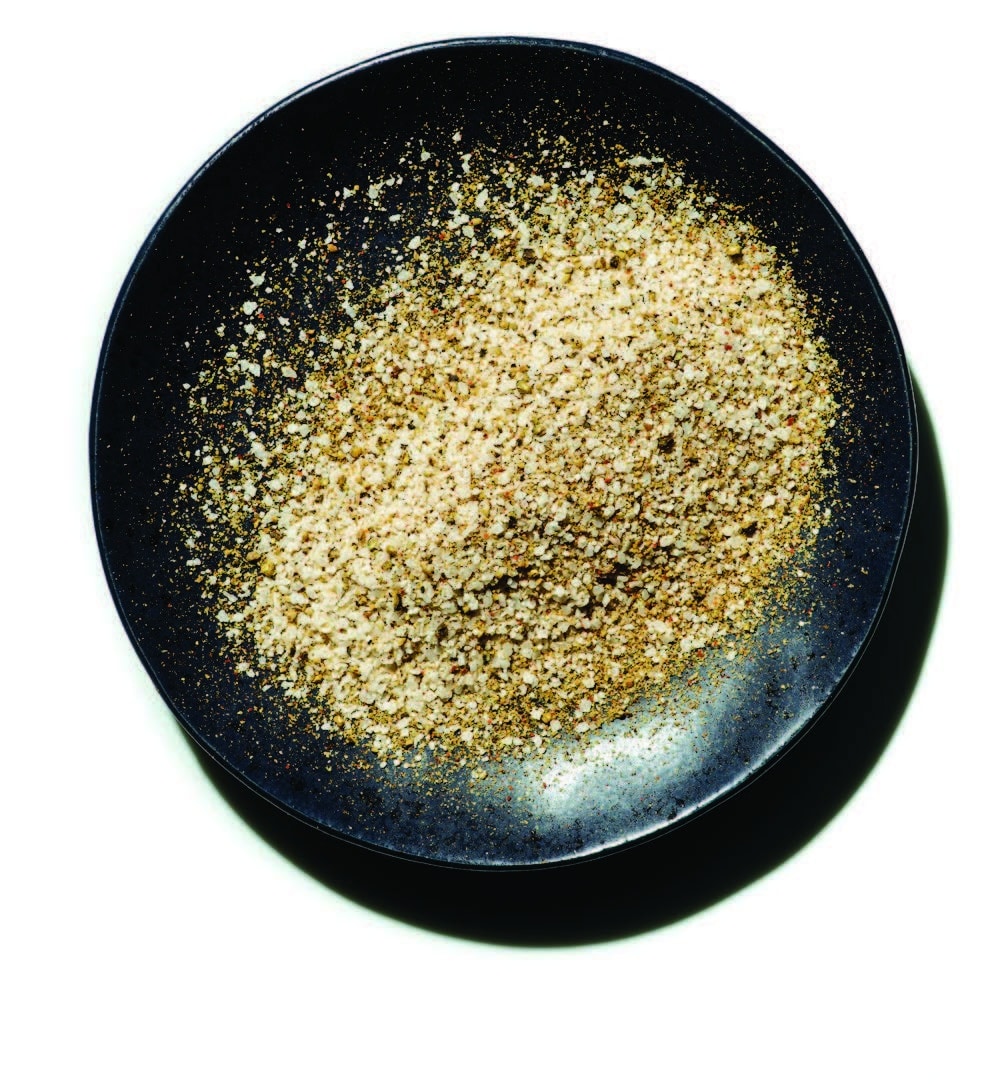 BBQ beef rub in a small bowl with salt and pepper clearly visible.