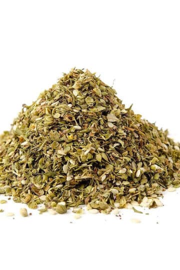 Bowl of za'atar spice blend with sesame seeds and herbs