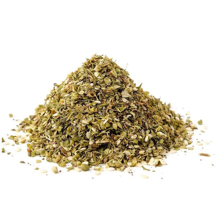 Bowl of za'atar spice blend with sesame seeds and herbs