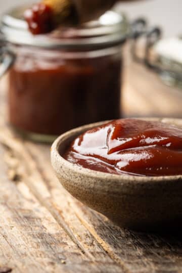 7-Up Barbecue Sauce in a bowl with a basting brush