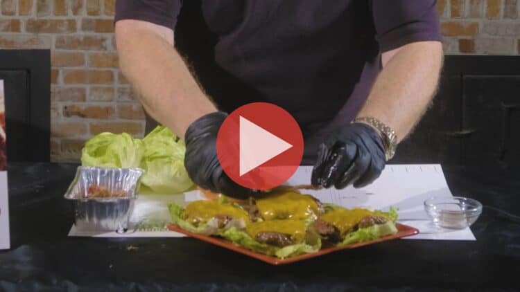 BBQ Pitmaster Myron Mixon plating keto bacon cheeseburgers fresh from the smoker