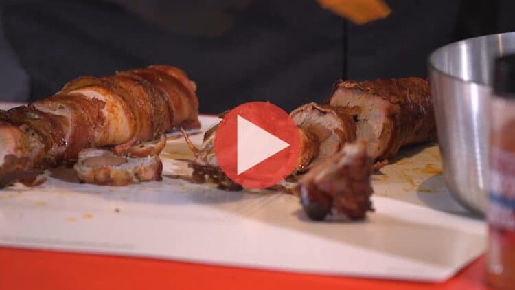 Myron Mixon preparing pork tenderloin stuffed with sausage and wrapped in bacon