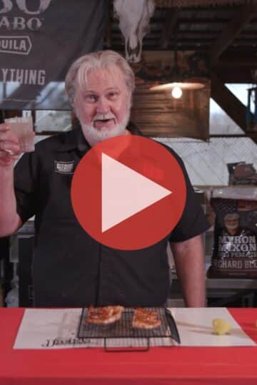 Grilled shrimp skewers on a rack with hot rub and blackberry sauce from BBQ Pitmaster