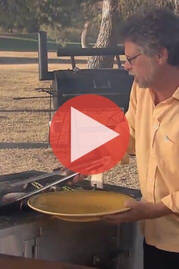 Steven Raichlen grilling shrimp and steaks in Spanish Smoke